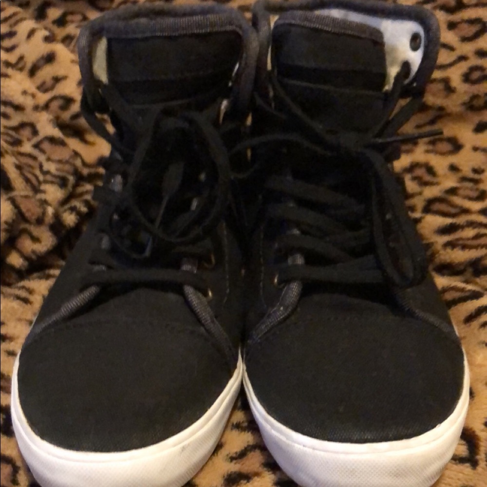 Old school high top vans in black.9